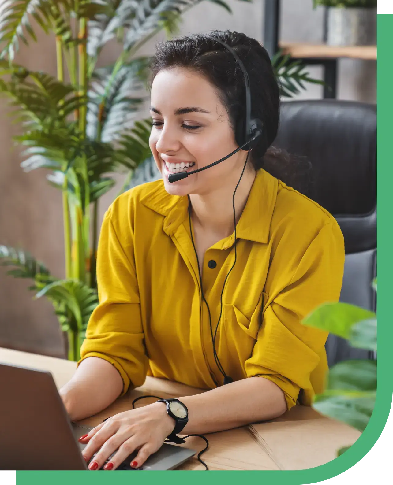 A smiling woman wearing a headset and working on a laptop in a bright office, symbolizing Peak Support’s friction-free communication solutions for gaming companies through multilingual, omnichannel, and 24/7 customer service.