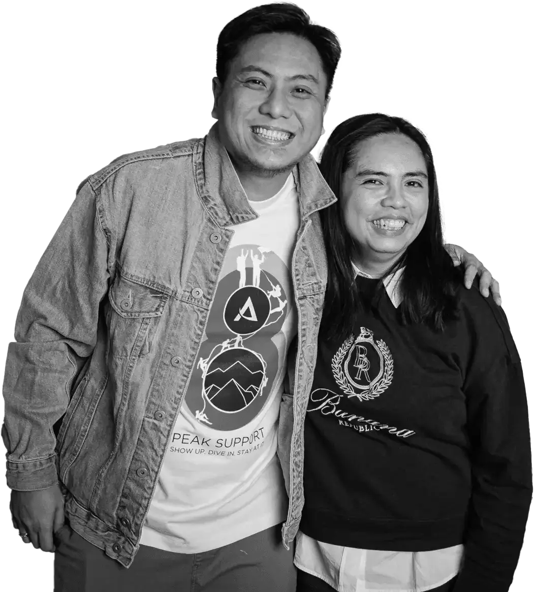 Peak Support team members are pictured smiling side by side, showing camaraderie and pride in representing the company. Peak Support empowers businesses with world-class customer care.